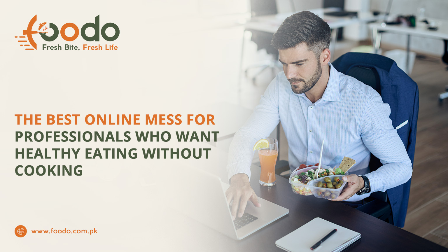 Professional eating a healthy meal at work while using a laptop, showing convenient online meal options without cooking – Foodo Fresh Bite Fresh Life.